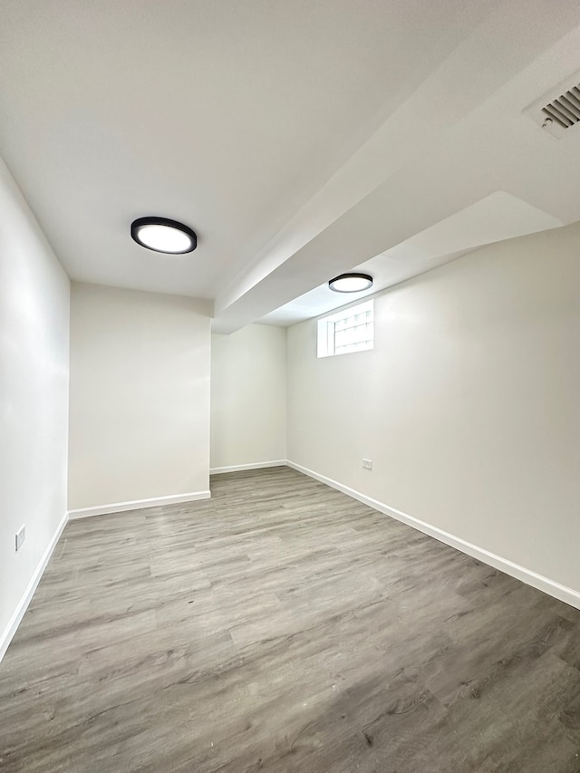 unfurnished room featuring light hardwood / wood-style flooring