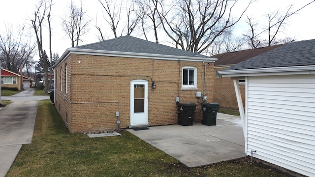 back of house with a patio area