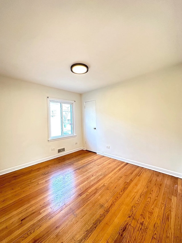 empty room featuring light hardwood / wood-style floors