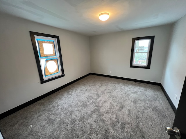 view of carpeted spare room