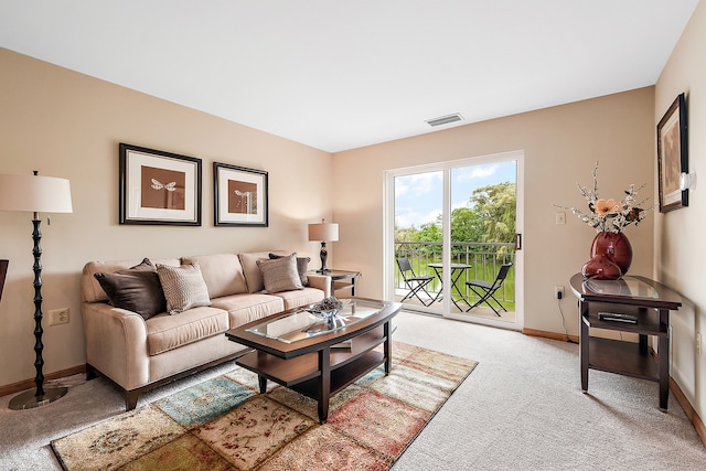 living room featuring light colored carpet