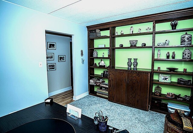 office space featuring baseboards
