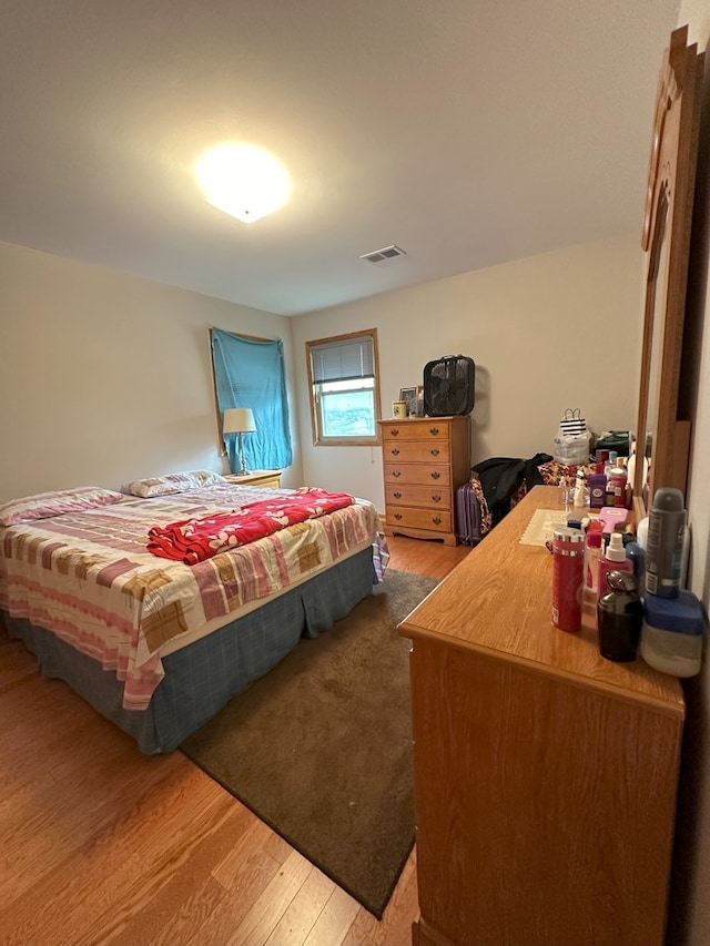 bedroom featuring light wood-type flooring