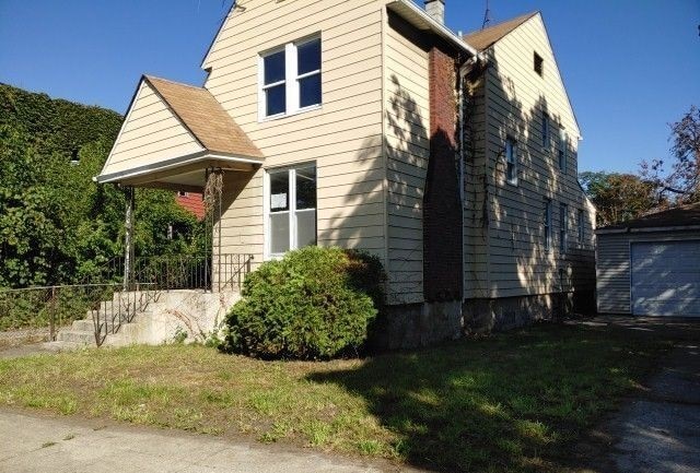 view of home's exterior with a garage