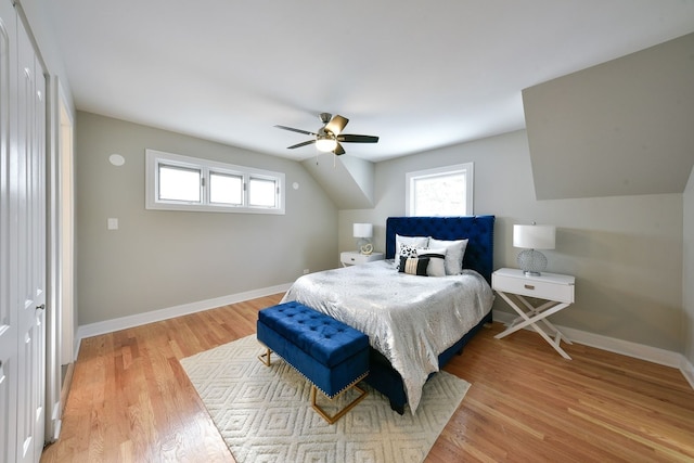 bedroom featuring ceiling fan and light hardwood / wood-style flooring