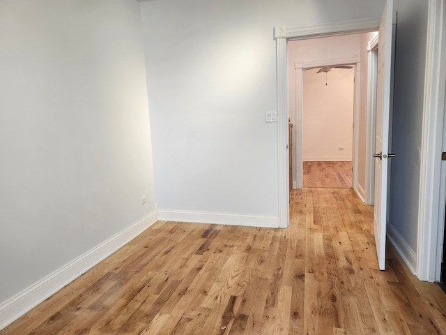 empty room with light hardwood / wood-style floors