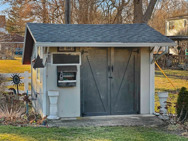 view of outdoor structure with a yard