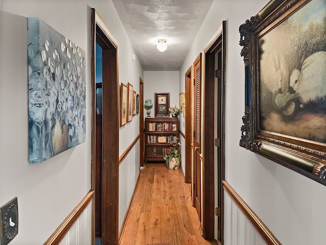 corridor featuring light wood-type flooring