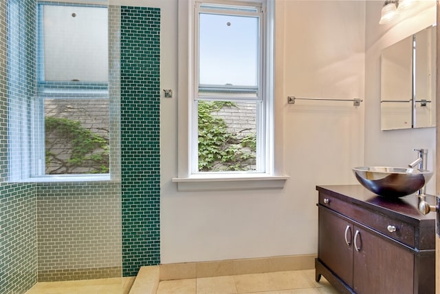 bathroom featuring vanity, tile floors, and a wealth of natural light