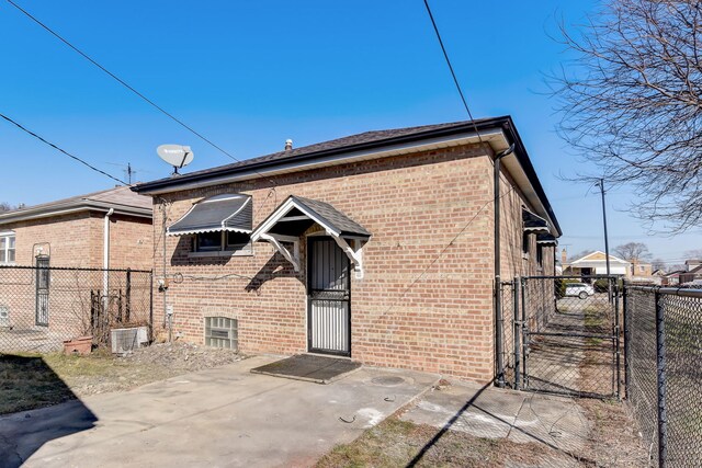 back of property with a patio area