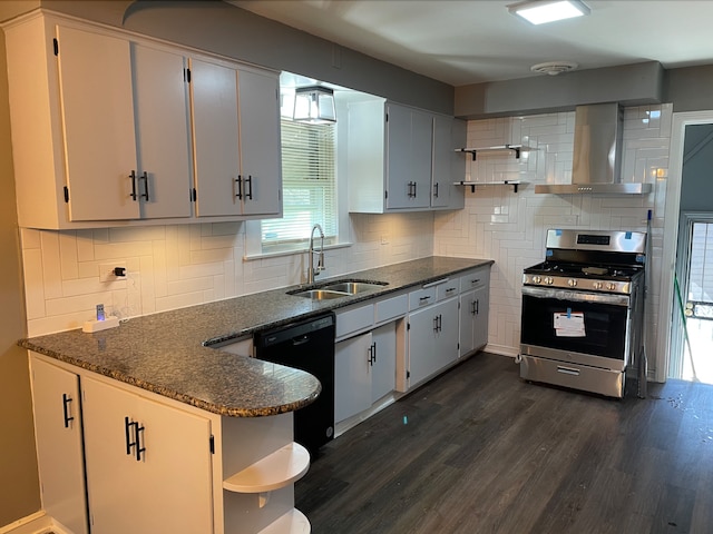 kitchen featuring dark wood-type flooring, sink, stainless steel range, dishwasher, and tasteful backsplash