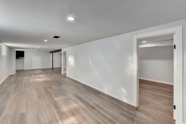 basement featuring dark wood-type flooring