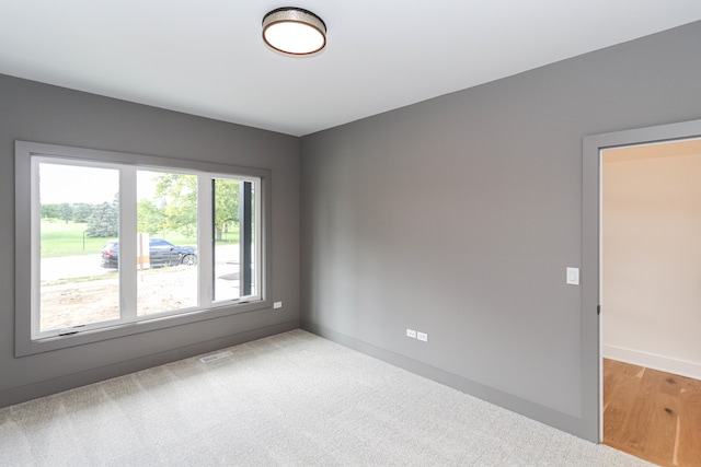 empty room with light wood-type flooring