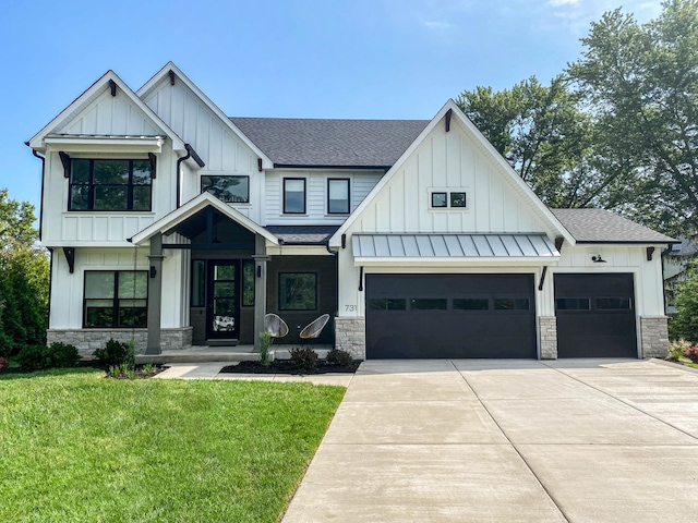 modern farmhouse featuring a front lawn