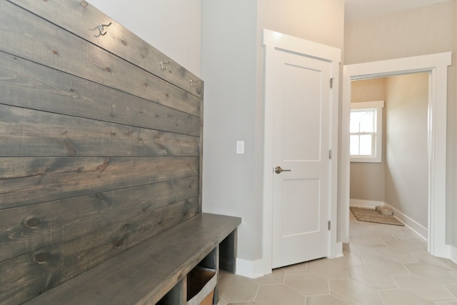 mudroom featuring light tile patterned flooring