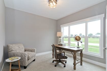 office area featuring light colored carpet and a healthy amount of sunlight