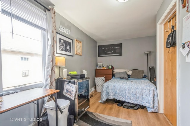 bedroom featuring hardwood / wood-style flooring