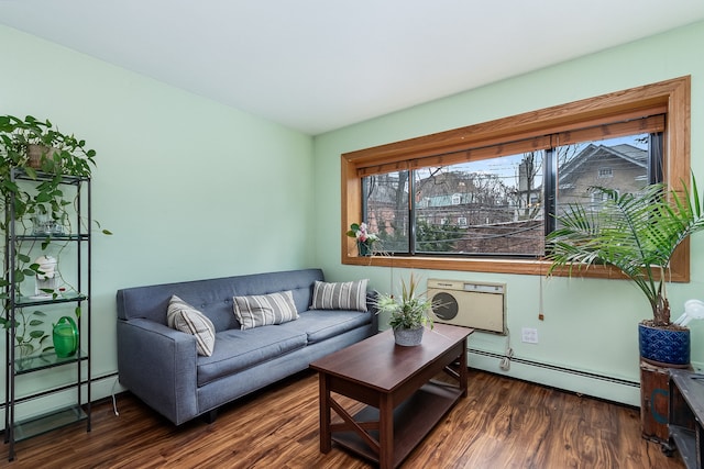 living room featuring dark hardwood / wood-style floors and a baseboard heating unit