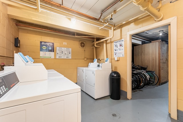 laundry area with washing machine and dryer