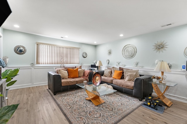 living room with light hardwood / wood-style floors