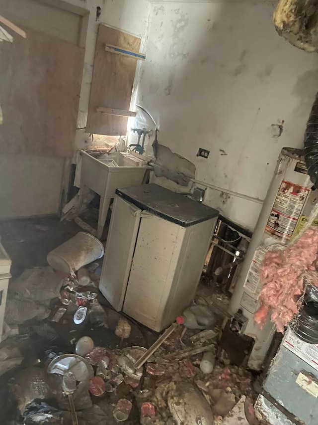 interior space featuring white refrigerator and sink