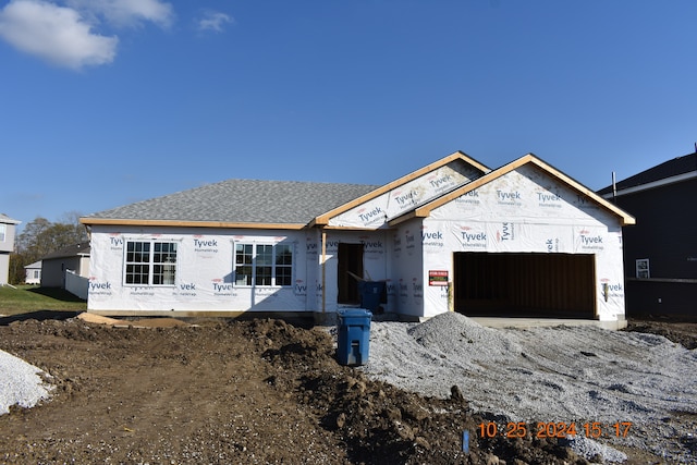 property under construction featuring a garage