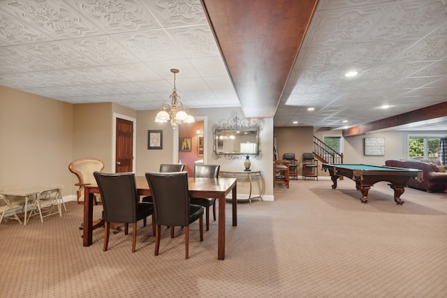 dining room with a notable chandelier, light carpet, and pool table