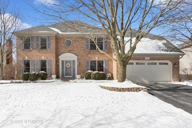 colonial house featuring a garage