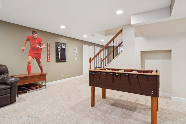 recreation room featuring carpet flooring