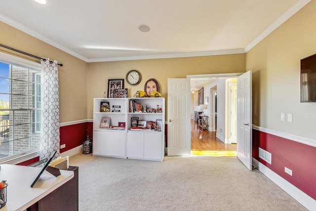 interior space with ornamental molding and light carpet