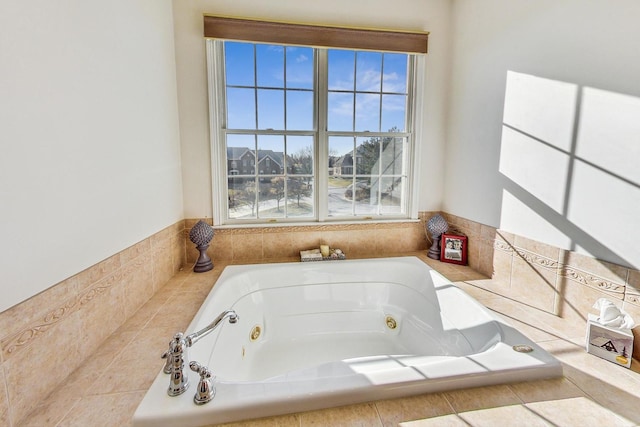 bathroom featuring a relaxing tiled tub