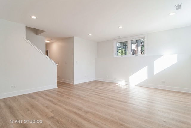 unfurnished room featuring light wood-type flooring