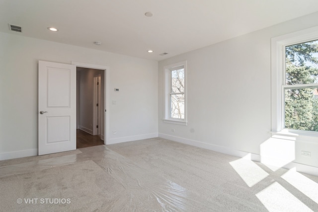 empty room featuring carpet floors