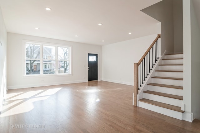 entrance foyer featuring hardwood / wood-style flooring