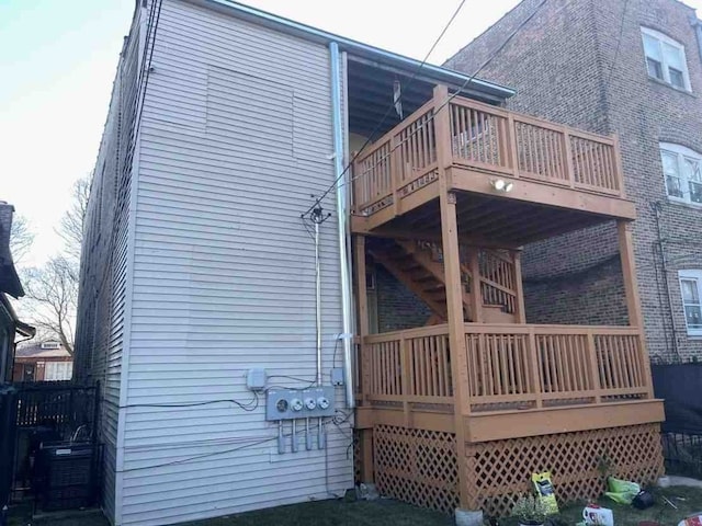 back of house featuring a deck