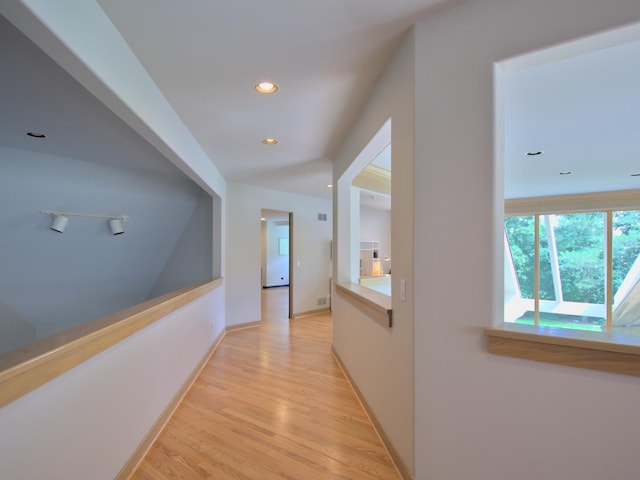 hallway featuring light wood-type flooring