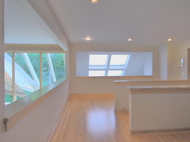 unfurnished room featuring light hardwood / wood-style flooring