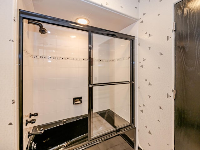 bathroom featuring an enclosed shower