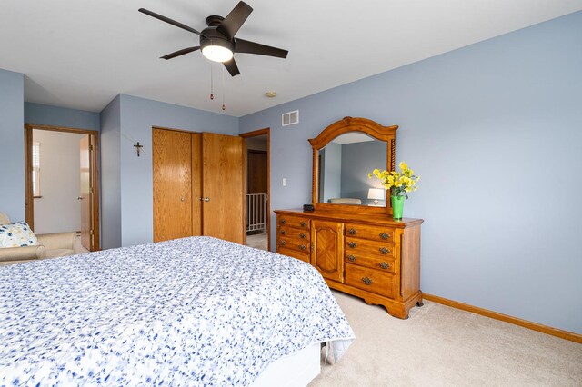 19154 Crescent Dr, Mokena, IL 60448 - bedroom with light colored carpet, a closet, and a ceiling fan