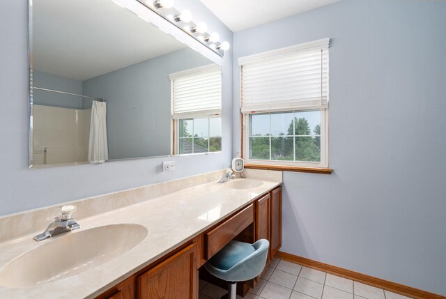 19154 Crescent Dr, Mokena, IL 60448 - full bath featuring tile patterned flooring, double vanity, and a shower with shower curtain
