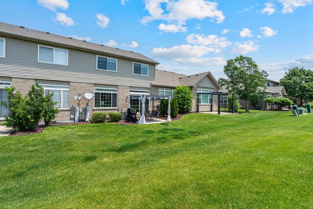 19154 Crescent Dr, Mokena, IL 60448 - rear view of house featuring a patio, a yard, a pergola, and brick siding