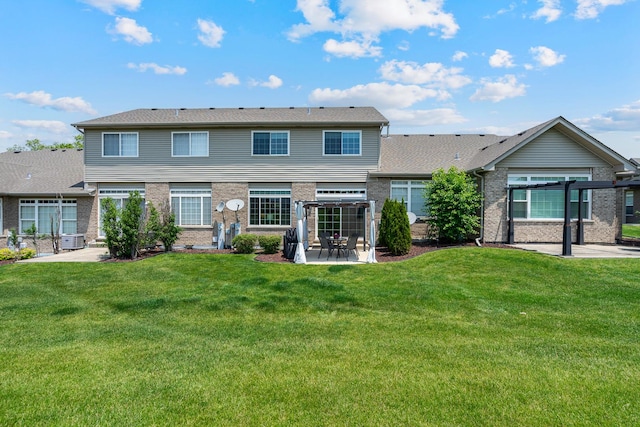 19154 Crescent Dr, Mokena, IL 60448 - back of property with a patio, a lawn, and brick siding