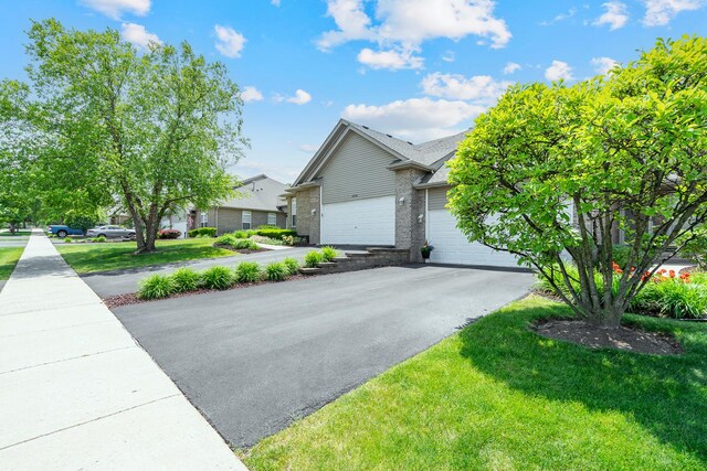 19154 Crescent Dr, Mokena, IL 60448 - view of front of home featuring driveway, a garage, and a front yard