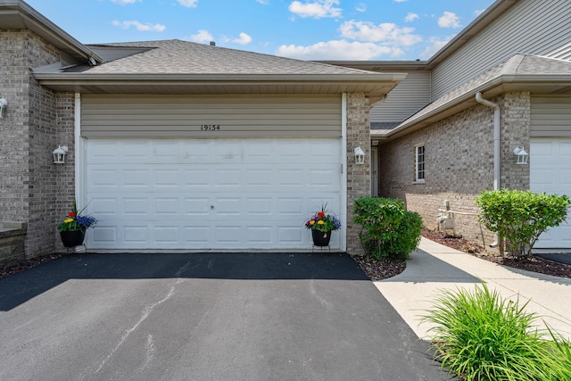 19154 Crescent Dr, Mokena, IL 60448 - garage with driveway