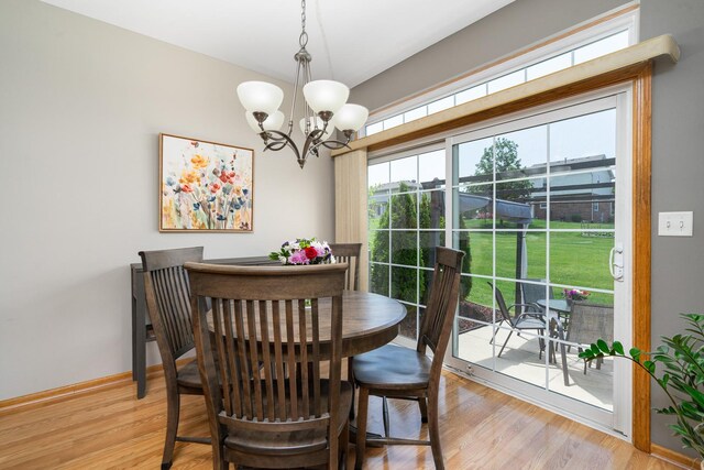 19154 Crescent Dr, Mokena, IL 60448 - dining area featuring a chandelier and light wood-type flooring