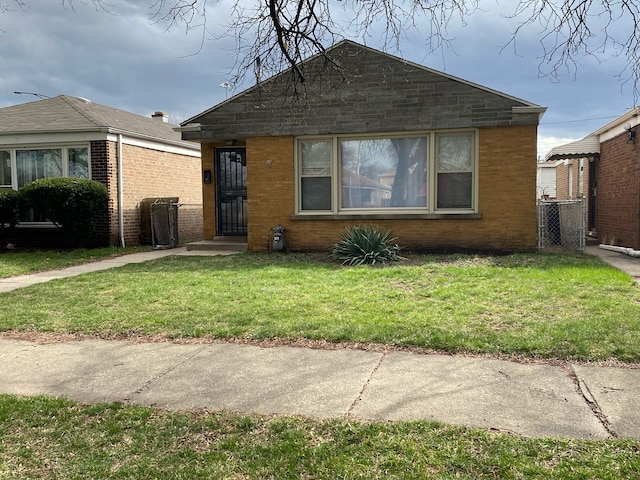 bungalow with a front lawn