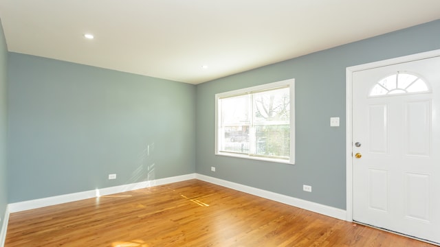 foyer with light hardwood / wood-style floors