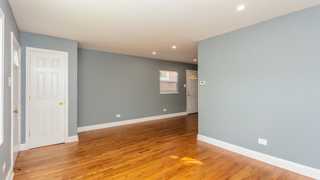 unfurnished room featuring light hardwood / wood-style flooring