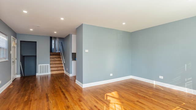 empty room featuring hardwood / wood-style floors