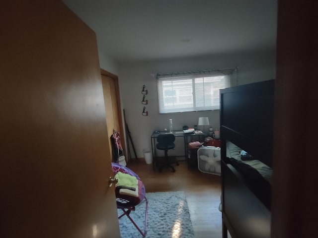 bedroom featuring hardwood / wood-style flooring